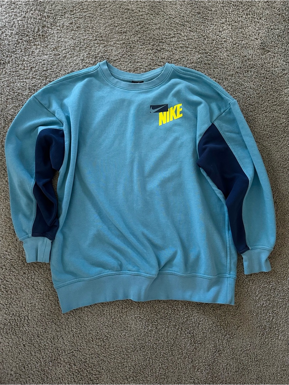 Nike Light Blue Crewneck Sweatshirt with Navy Sleeve Panels and Yellow Logo
